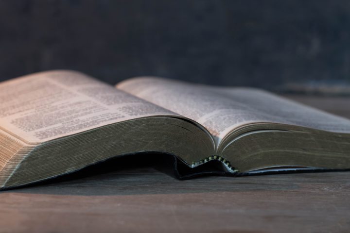 Bible on wooden background